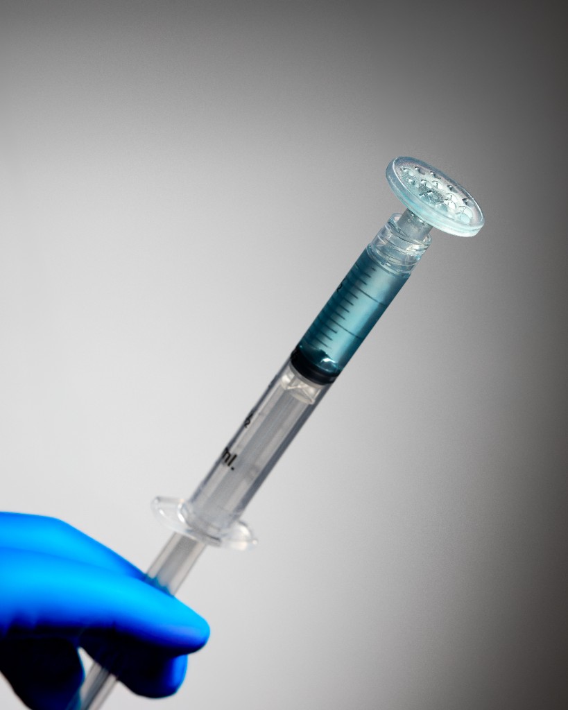 CuraCator single-use precision applicator for topical biologic delivery